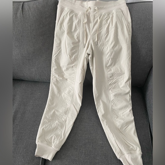 Brown, bone and green Lululemon midrise joggers. Bone has a light lining. Size 8 - Picture 4 of 7